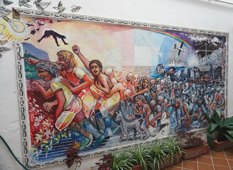Mural painting about migration (Malaga)