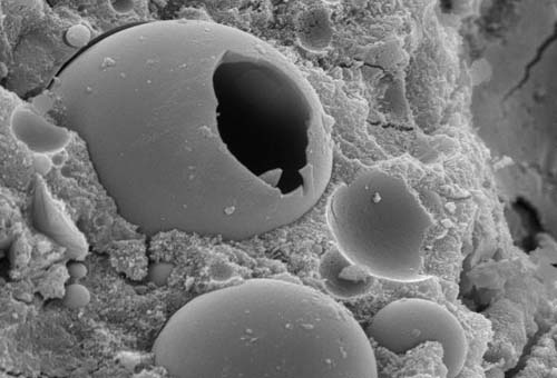 fly ash particle embedded in paste