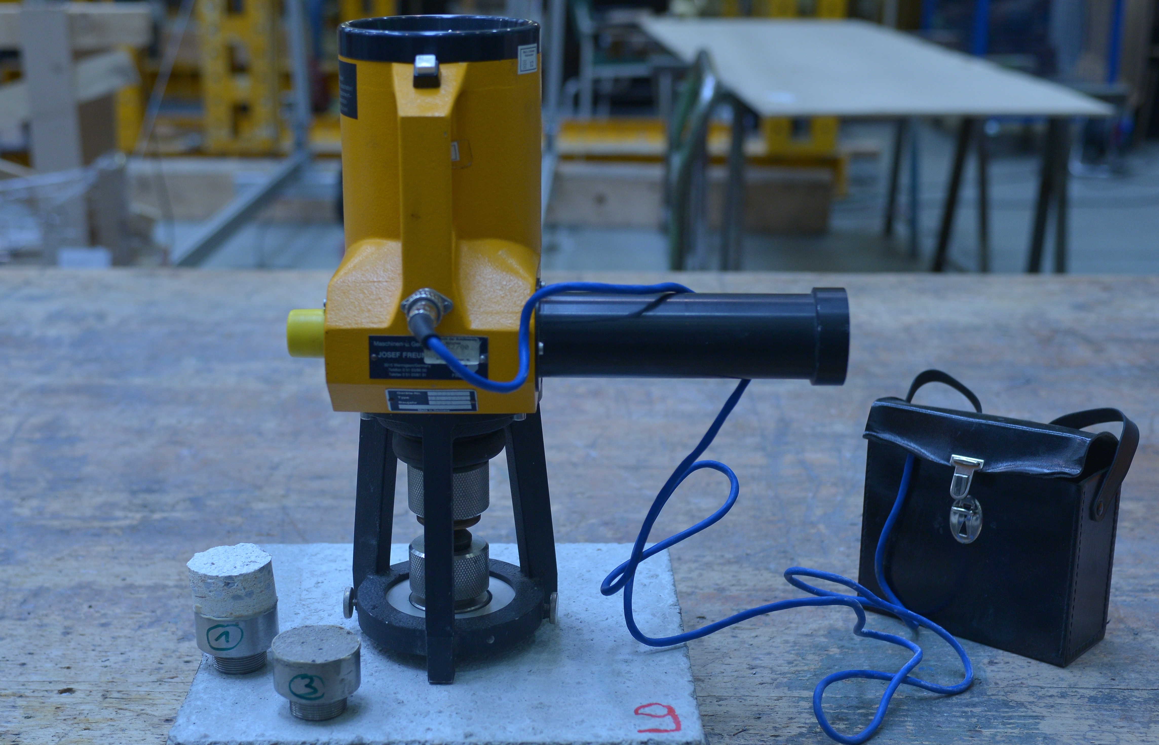 Bonding test setup on a concrete sample with bond stamps